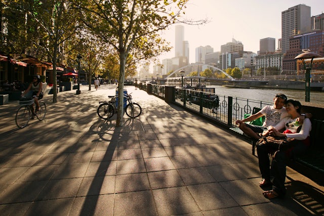 Melbourne Southbank with bicycle and couple on bench